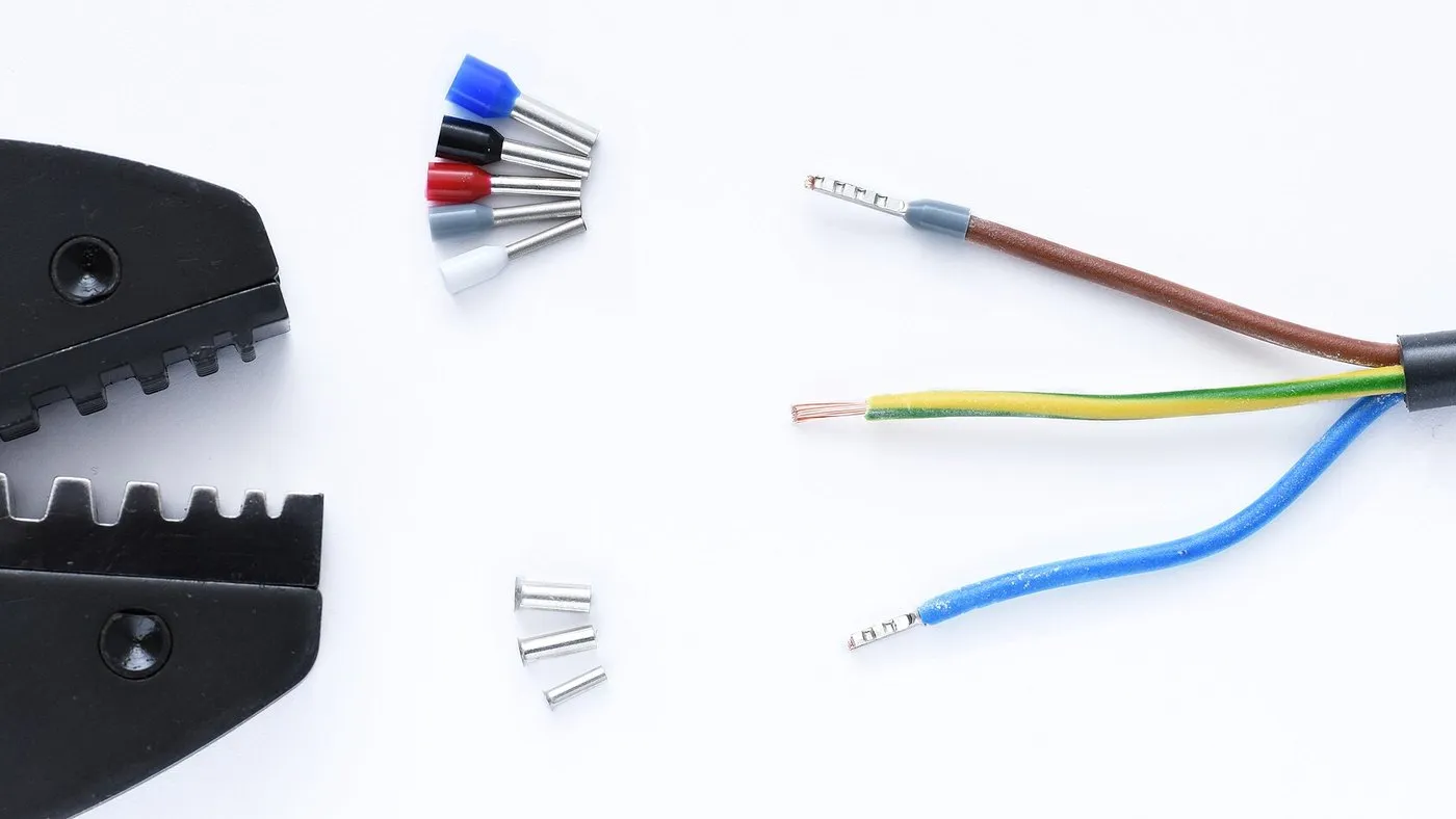Wire ferrules, prepared conductors and a crimping tool